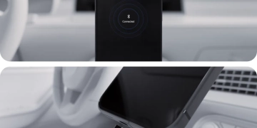Phone showing the Android Auto Bluetooth connected screen mounted inside a car