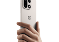 OnePlus 15 in white held in hand, the design reference for the confirmed OnePlus 16