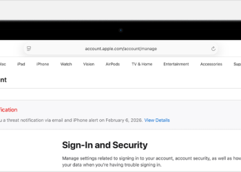 Apple threat notification banner shown at the top of an Apple Account page in Safari on macOS