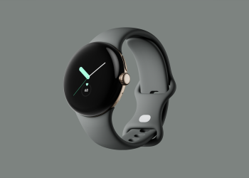 Original Google Pixel Watch in gold with a grey band, shown against a grey background