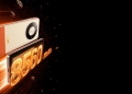 Honor Turbo in orange and beige with 8560mAh shown on its display