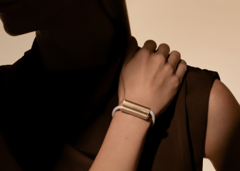 Luffu Link screenless LTE health and safety band in halo gold worn on a wrist