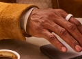 White Oura smart ring worn on a hand, illustrating the sleep-tracking accuracy lawsuit