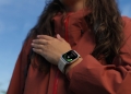 Huawei Watch D3 on a wrist taking a blood pressure reading with its inflatable cuff strap