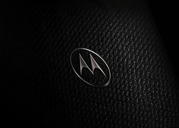 Motorola Signature 27 teaser showing the Motorola batwing logo on a dark woven Tactical Weave surface