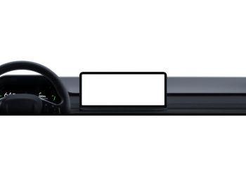 Car dashboard with the Android Auto infotainment display and digital instrument cluster