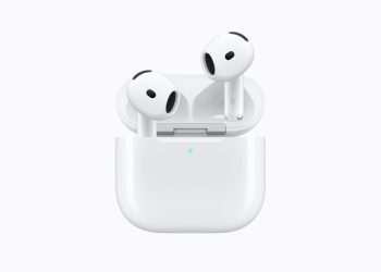 Standard Apple AirPods 5 earbuds sitting in the open Wireless Charging Case on a white background