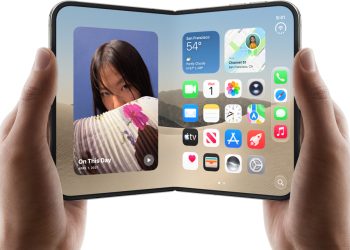 Apple iPhone Duo foldable held open in two hands, showing iOS home screen widgets