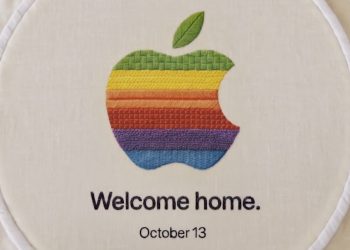Apple Welcome home October 13 event artwork, a rainbow Apple logo embroidered on linen