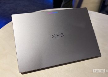 Dell XPS Googlebook closed on a table, showing the aluminium lid and the Glowbar light strip near the hinge