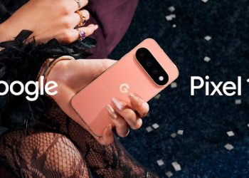 Hand holding a coral Google Pixel 11 phone