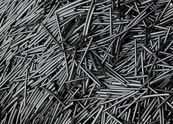 Pile of titanium rods at Perryman Company, a US titanium supplier for the iPhone Duo