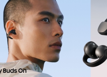Man wearing a black Samsung Galaxy Buds On open-ear earbud clipped to his ear, with the pair shown close up