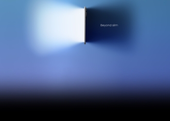 Samsung Galaxy S25 Edge standing edge-on against a blue gradient, showing its slim profile