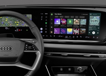 Native Spotify app on the Audi MMI center display showing the Your Library screen