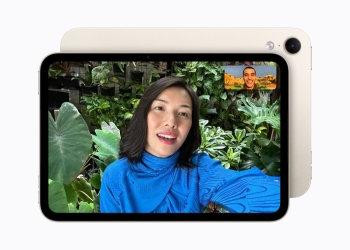 New iPad mini (A20 Pro) in Starlight, front screen on a FaceTime call and back showing the single rear camera
